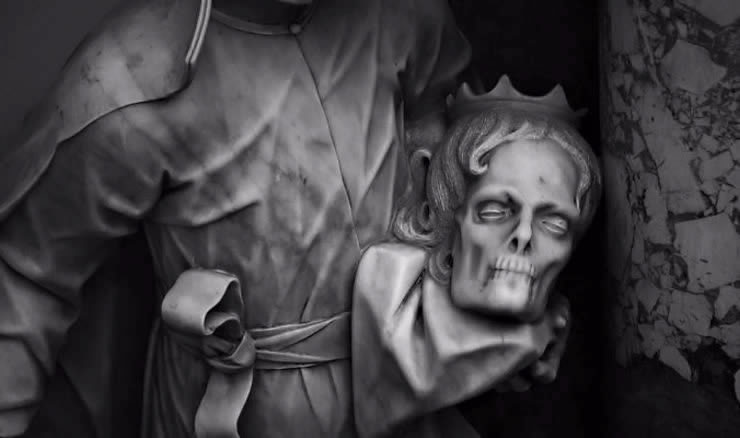 stoji mramorni kip sv. Franje Borgie koji ruci drži glavu Izabele Portugalske